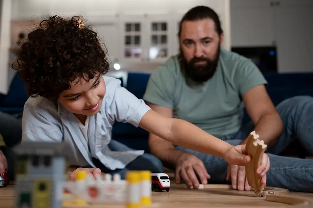 side-by-side play parent and child