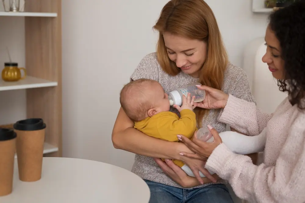 women trying to feed new born