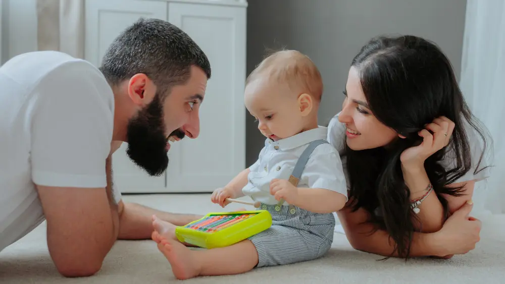 Family bonding time with musical toy.
